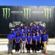 Interns pose at a NASCAR event